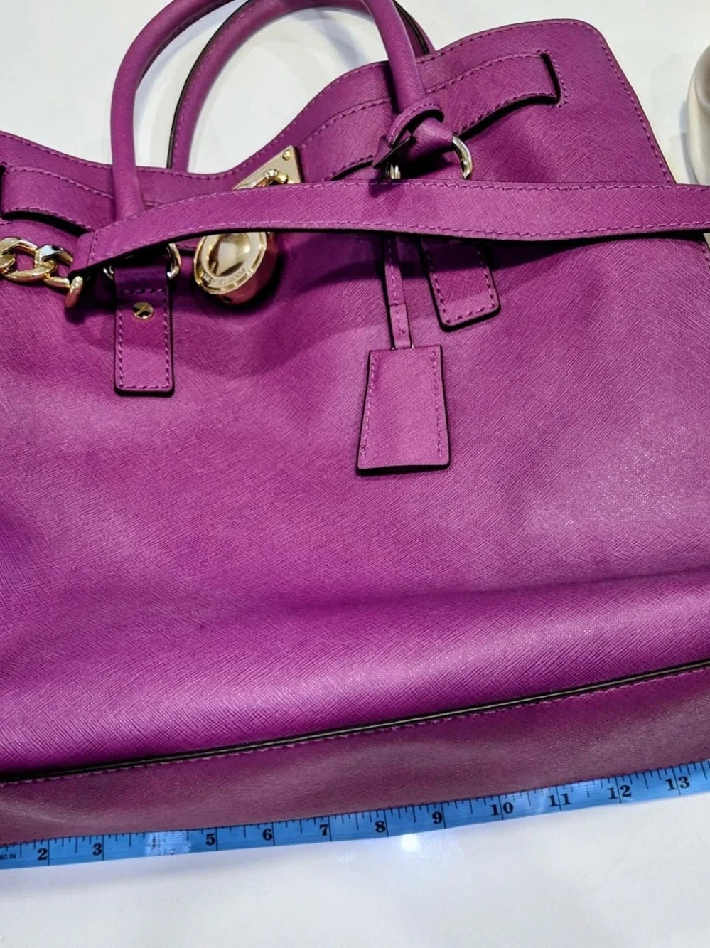 Michael Kors Hamilton large Saffiano leather tote featuring striking gold-tone
